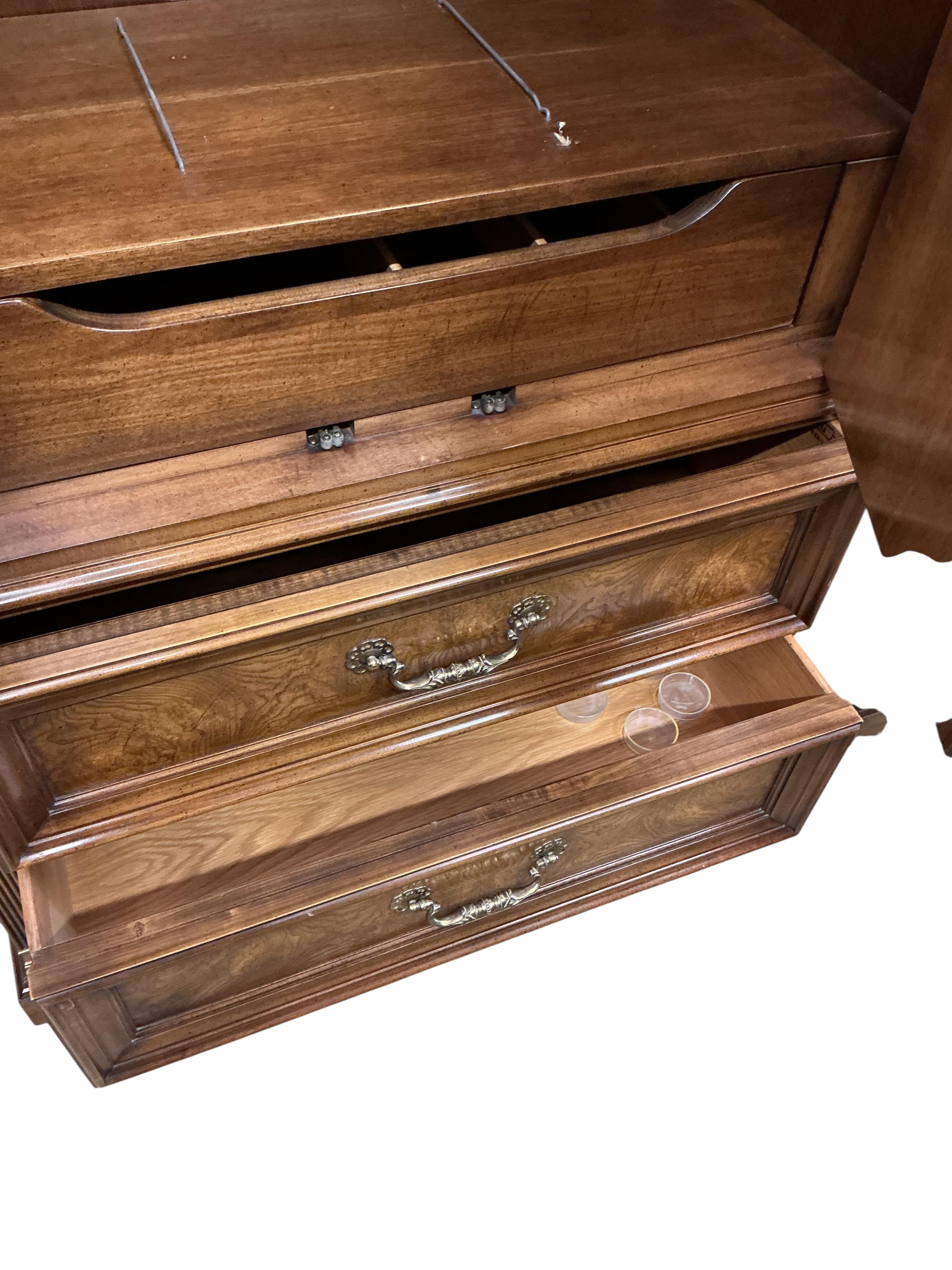 An American reproduction cedar and burr wood press cupboard, width 101cm, depth 50cm, height 154cm